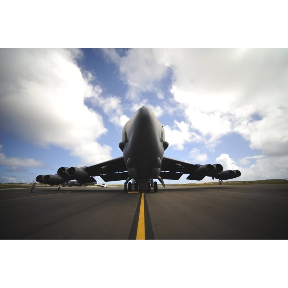 A U.S. Air Force maintenance crew performs post flight checks on a B-52 Stratofortress Poster Print Image 1