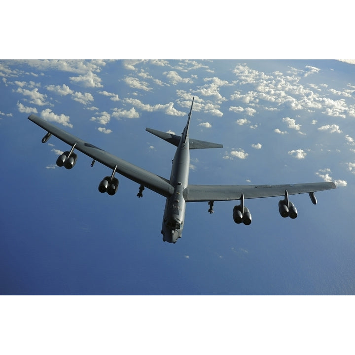 A U.S. Air Force B-52 Stratofortress flies a mission over the Pacific Ocean Poster Print Image 1