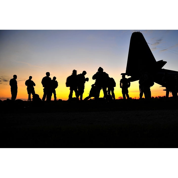 Green Berets prepare to board a KC-130 aircraft Poster Print Image 1