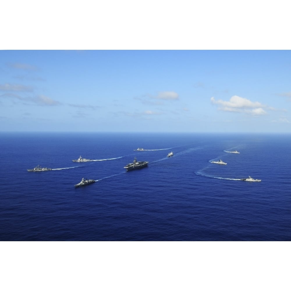 Ships from the Ronald Reagan Carrier Strike Group transit the Pacific Ocean Poster Print Image 1