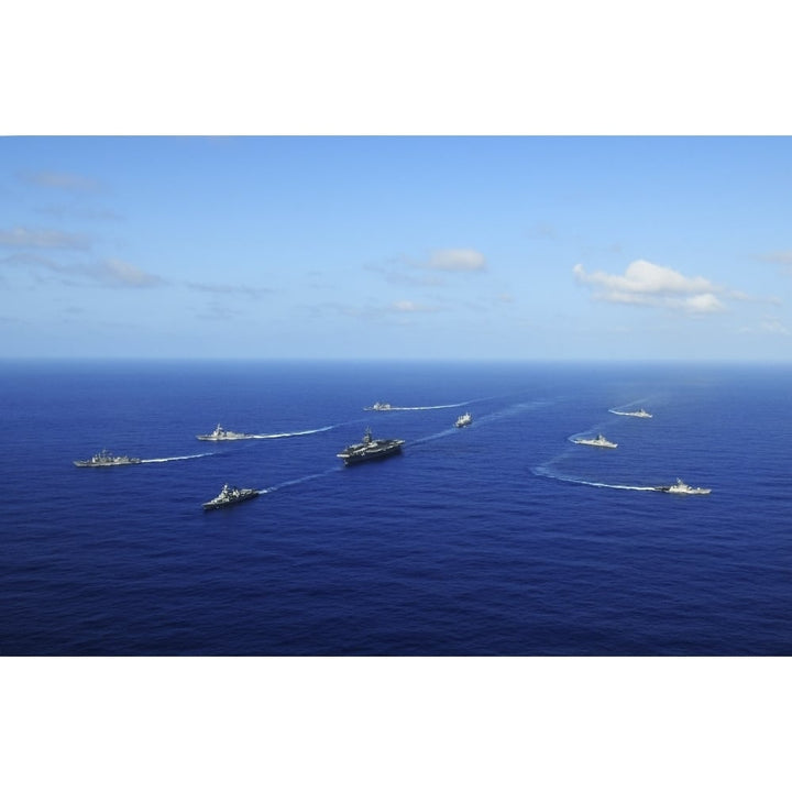 Ships from the Ronald Reagan Carrier Strike Group transit the Pacific Ocean Poster Print Image 1