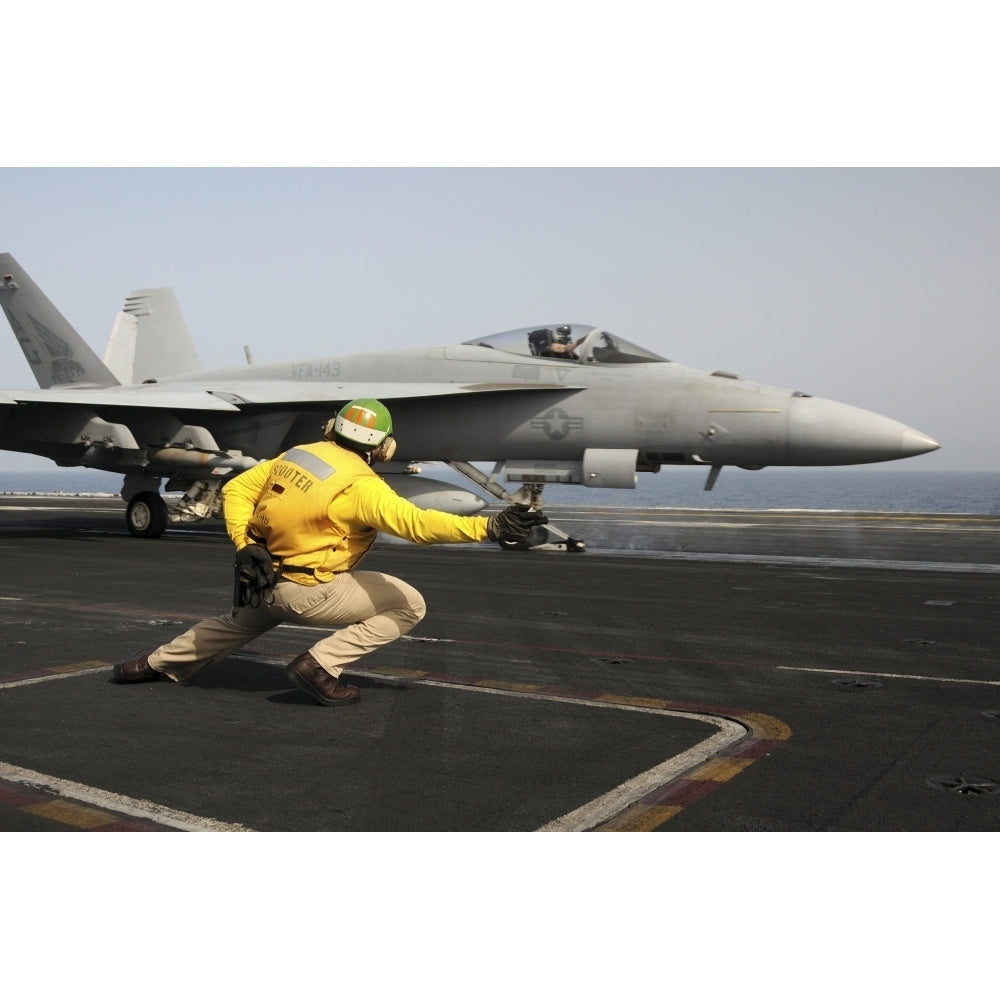 A shooter launches an F/A-18E Super Hornet from USS Dwight D Eisenhower Poster Print Image 2