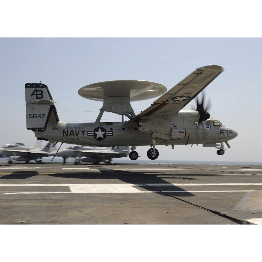 An E-2C Hawkeye lands aboard the aircraft carrier USS Enterprise Poster Print Image 2