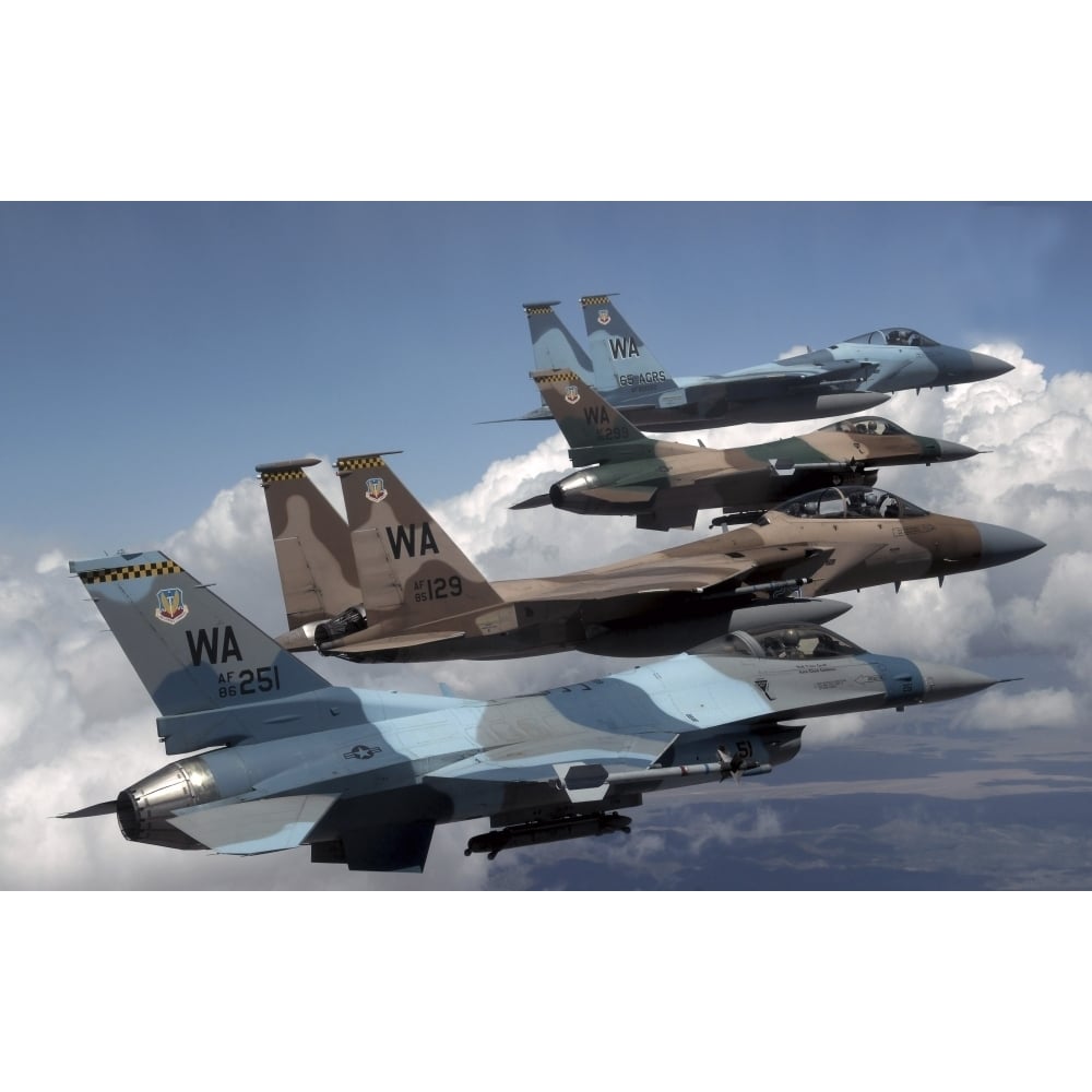 A flight of Aggressor F-15 and F-16 aircraft fly in formation Poster Print Image 2