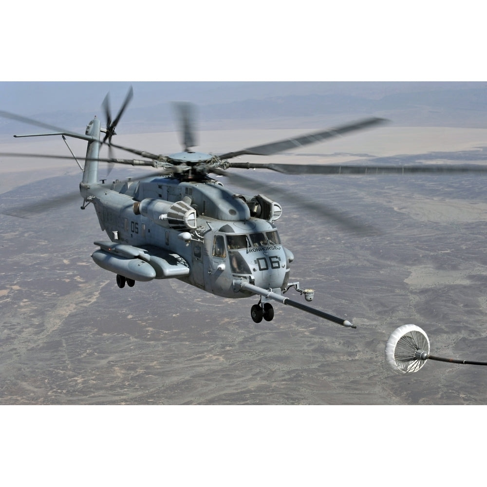 A CH-53E Super Stallion approaches a C-130P aircraft to refuel Poster Print Image 2