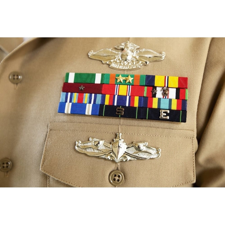 Close-up view of military decorations and honors on the uniform of a Petty Officer Poster Print Image 1