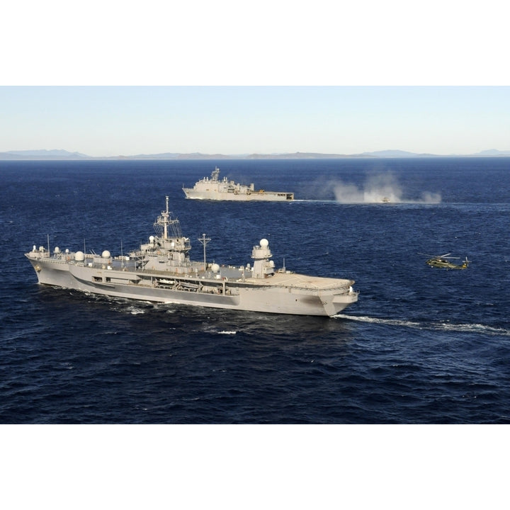 USS Blue Ridge conducts flight operations in the Coral Sea while underway with USS Germantown Poster Print Image 1