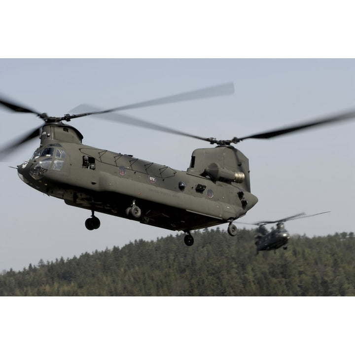 Two CH-47 Chinook helicopters in flight Poster Print Image 1