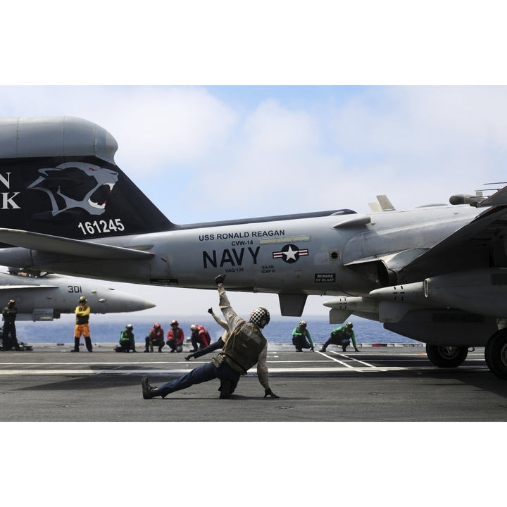 Shooters signal satisfactory final checks of an EA-6B Prowler before launch Poster Print Image 2