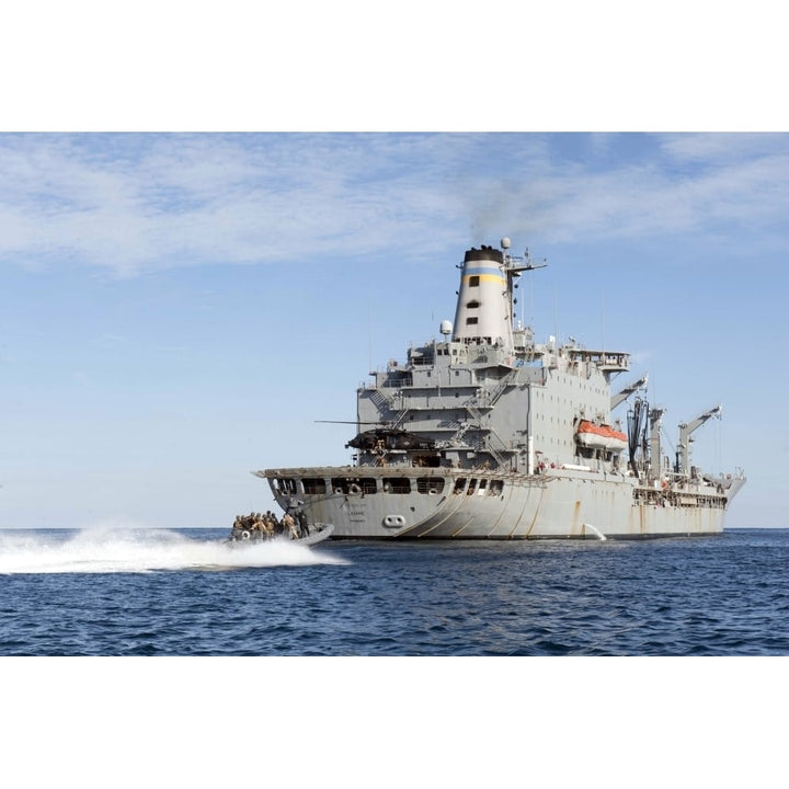 Marines in an inflatable boat head towards USS York Poster Print Image 1