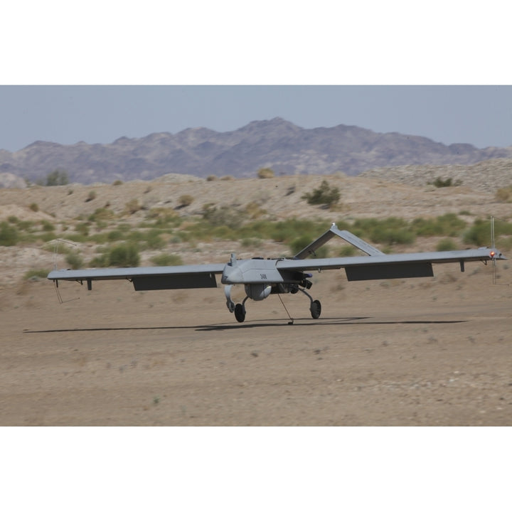 An RQ-7B Shadow unmanned aerial vehicle prepares to land Poster Print Image 1