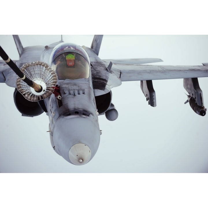 An F/A-18 Super Hornet receives fuel over Afghanistan Poster Print Image 1