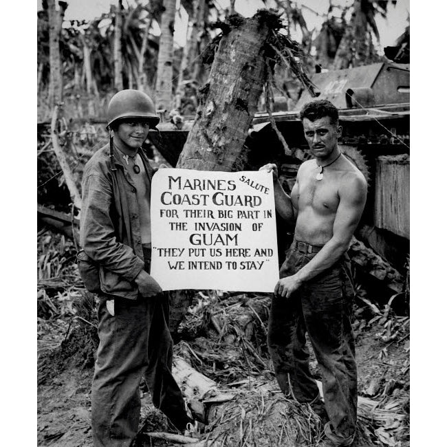 The US Marines salute the US Coast Guard after teh battle for Guam Poster Print by Stocktrek Images Image 1