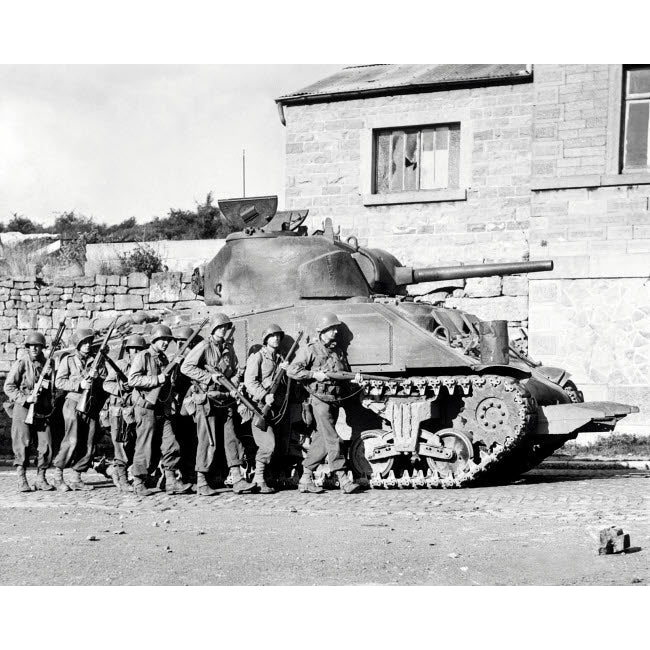 Soldiers and their tank advance into a Belgian town during WWII Poster Print by Stocktrek Images Image 2