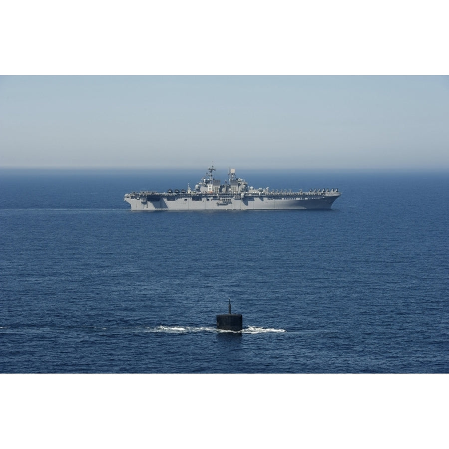 USS Hampton transits alongside USS Makin Island Poster Print Image 1