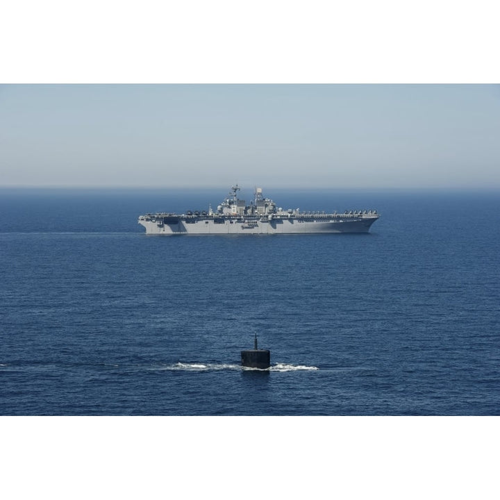 USS Hampton transits alongside USS Makin Island Poster Print Image 1