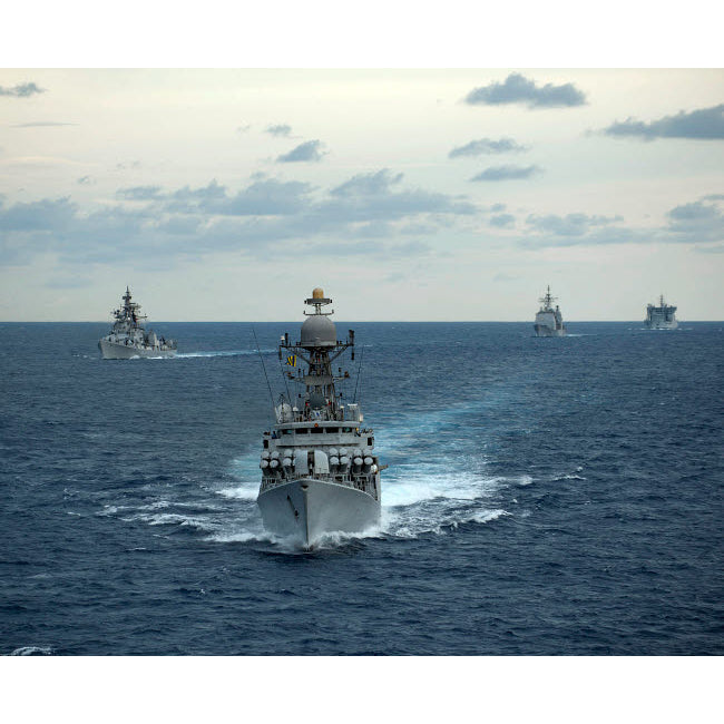 Indian Navy corvette ship INS Kulish leads a group of US Navy ships Poster Print by Stocktrek Images Image 1