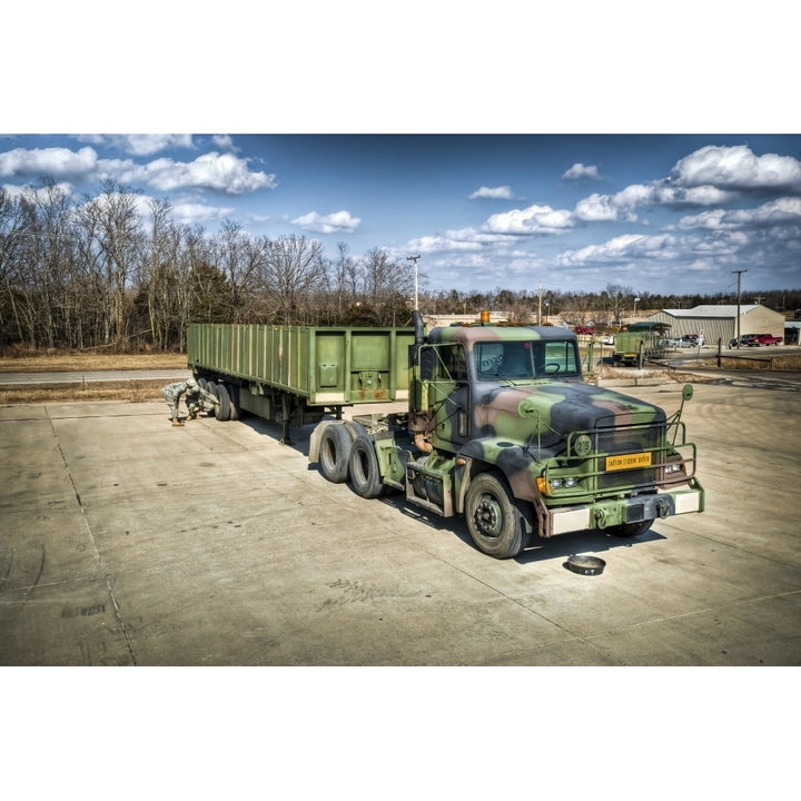 Students checking the trailer of a M872 truck Poster Print Image 1