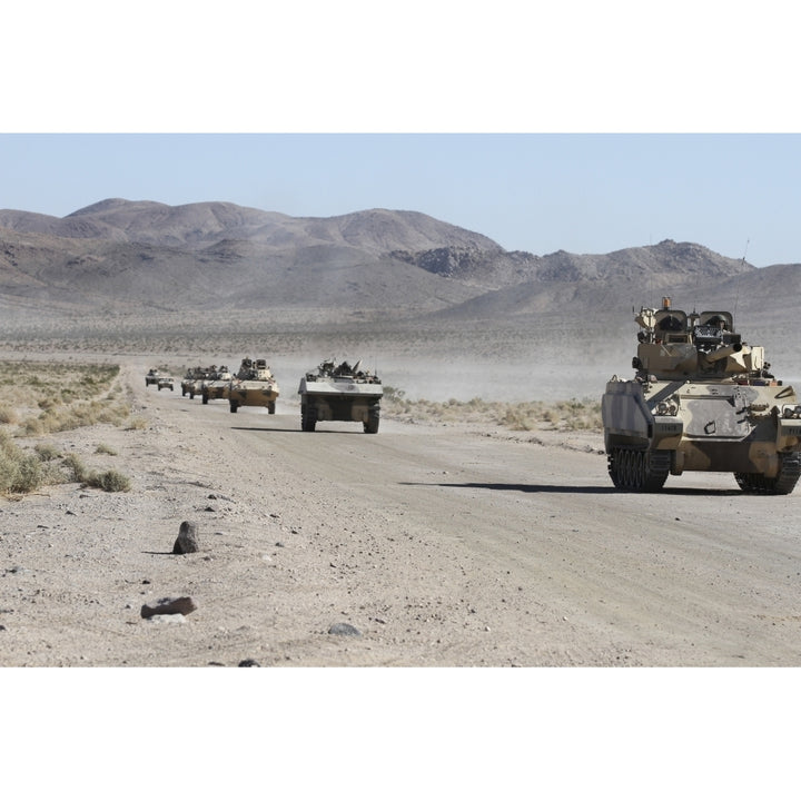 Convoy of military vehicles traveling in Fort Irwin California Poster Print Image 2