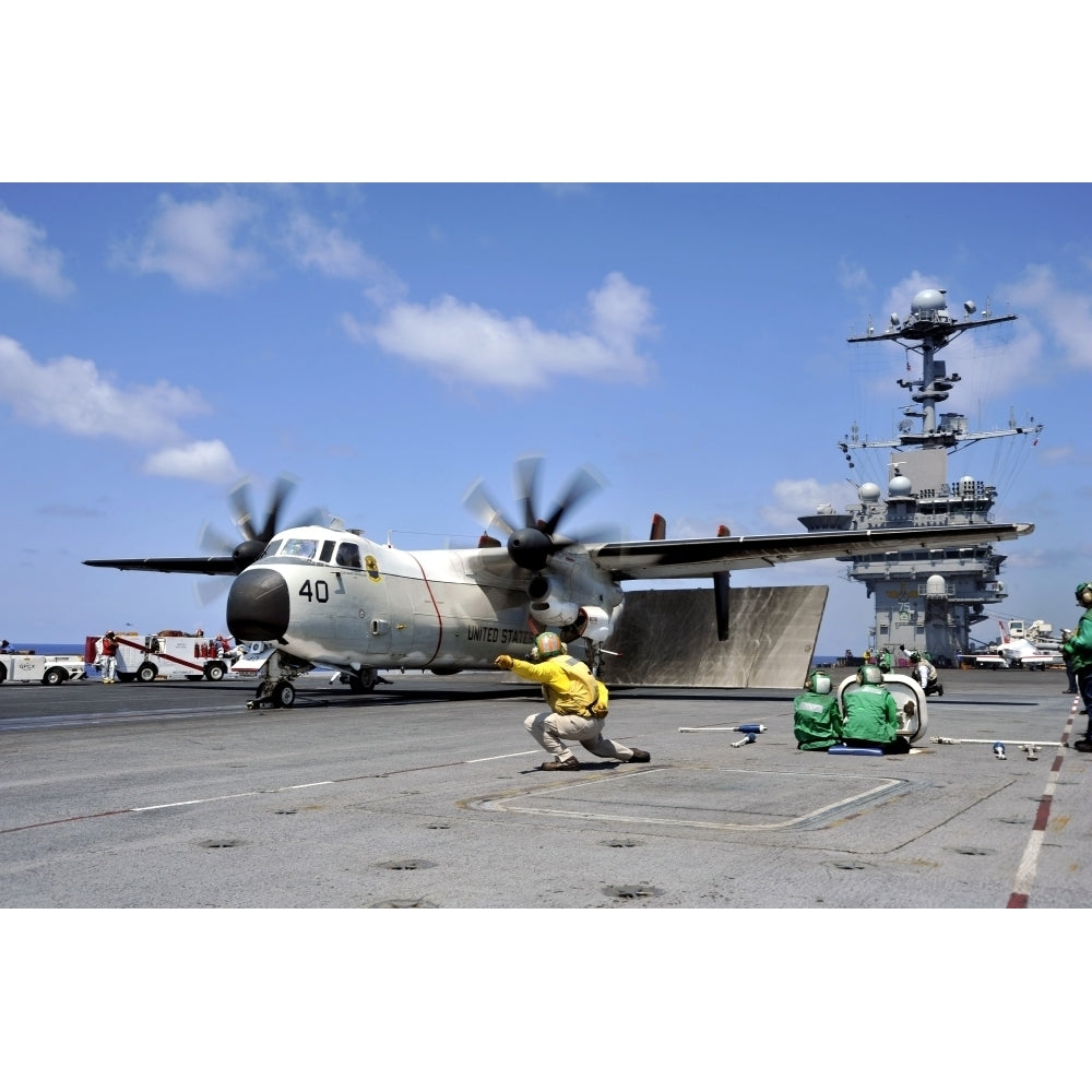 A shooter signals for the launch of a C-2A Greyhound Poster Print Image 2