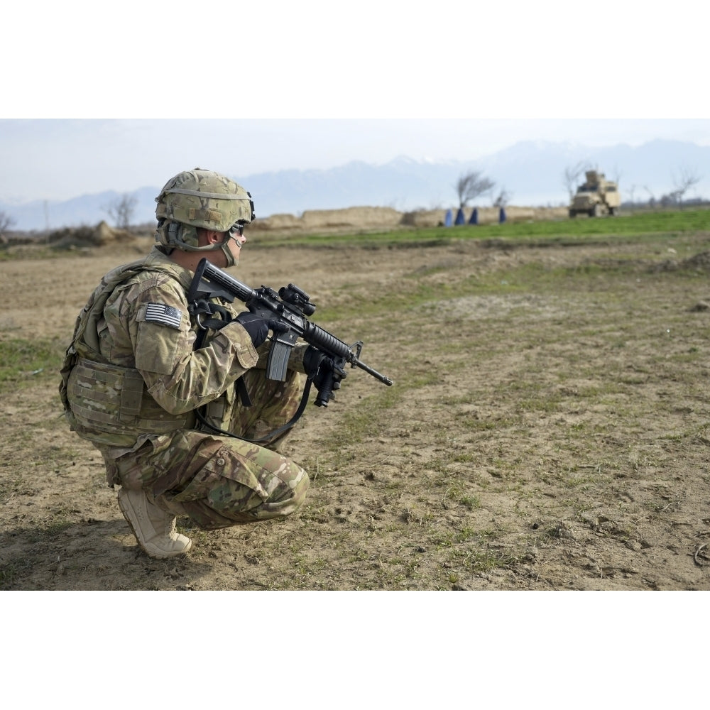 U.S. Soldier patrols a village in Afghanistan Poster Print Image 2