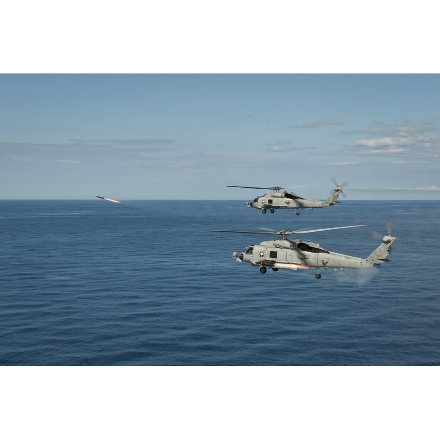 MH-60R Sea Hawk helicopters launch AGM-114 hellfire missiles Poster Print Image 1