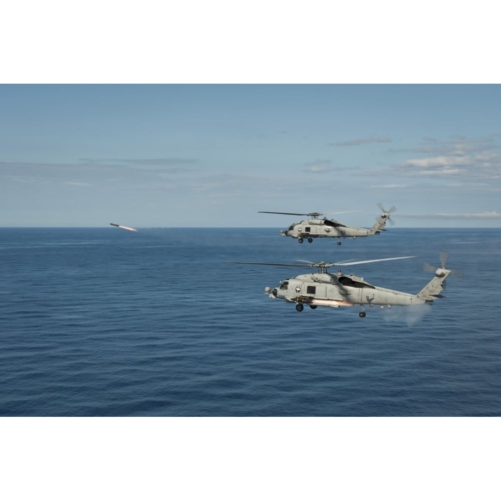 MH-60R Sea Hawk helicopters launch AGM-114 hellfire missiles Poster Print Image 1