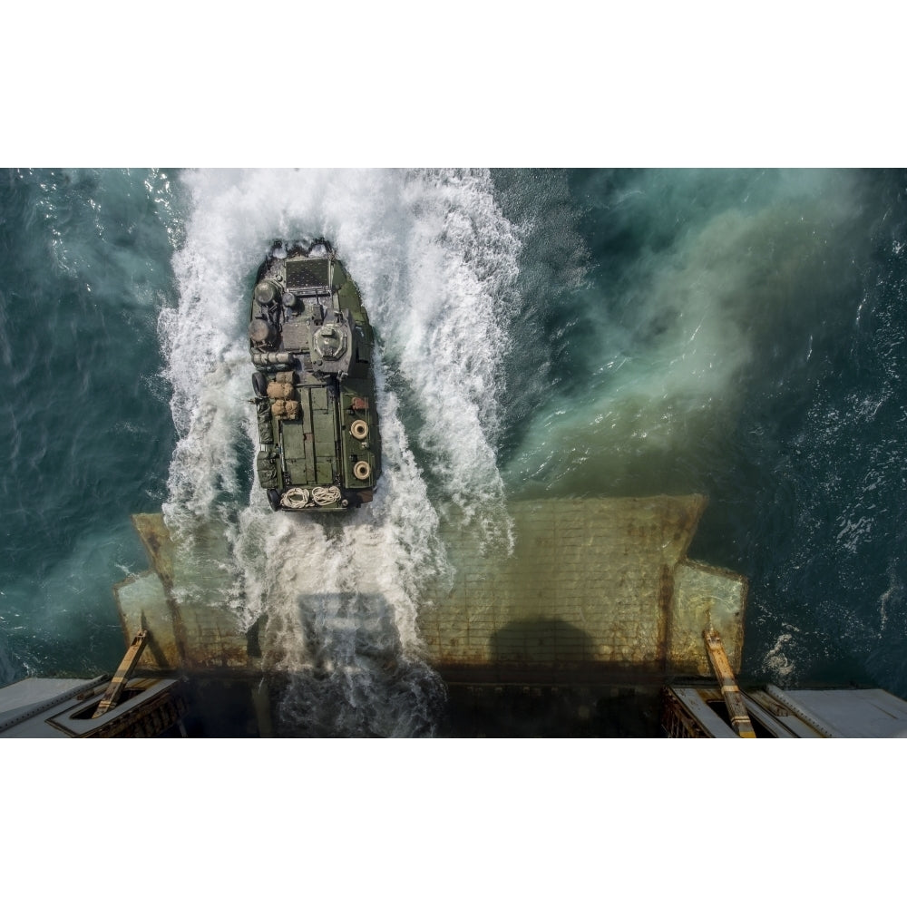 An amphibious assault vehicle exits the well deck of USS Bataan Poster Print Image 2