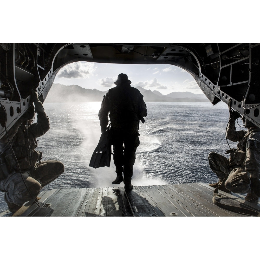 A soldier conducts a combat dive mission off the back of a CH-47 Chinook Poster Print Image 1