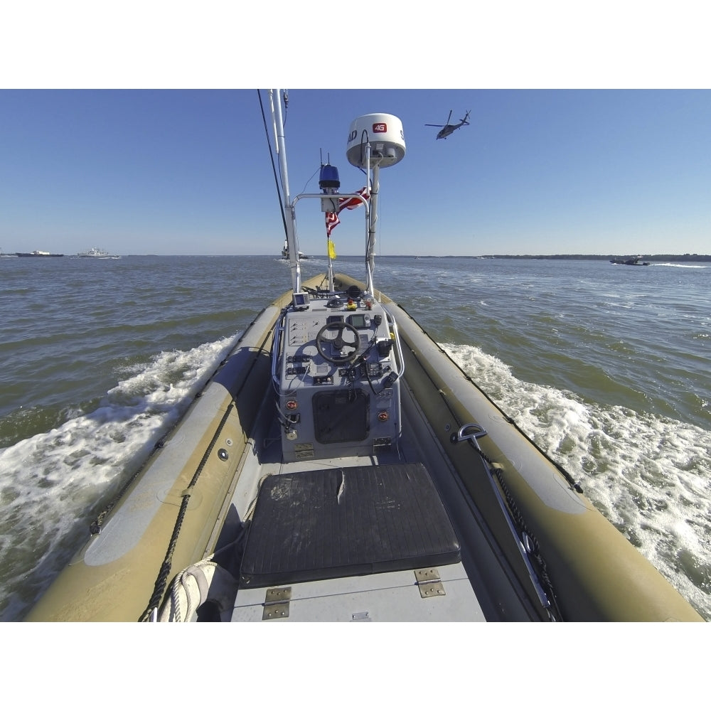 An unmanned rigid-hull inflatable boat on the James River in Newport News Virginia. Poster Print by Stocktrek Images Image 2