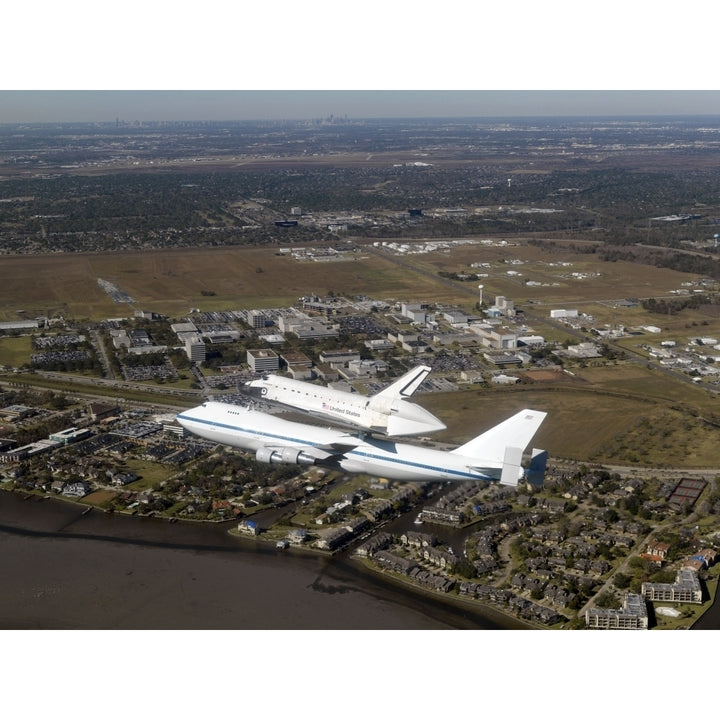 Space Shuttle Endeavour mounted on a modified Boeing 747 shuttle carrier aircraft Poster Print Image 1