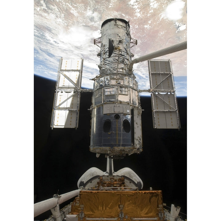 The Hubble Space Telescope is released from the cargo bay of Space Shuttle Atlantis Poster Print Image 2