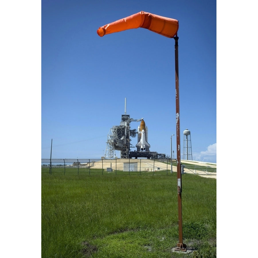 Space shuttle Endeavour is framed by a windsock at the launch pad at Kennedy Space Center Florida Print Image 1