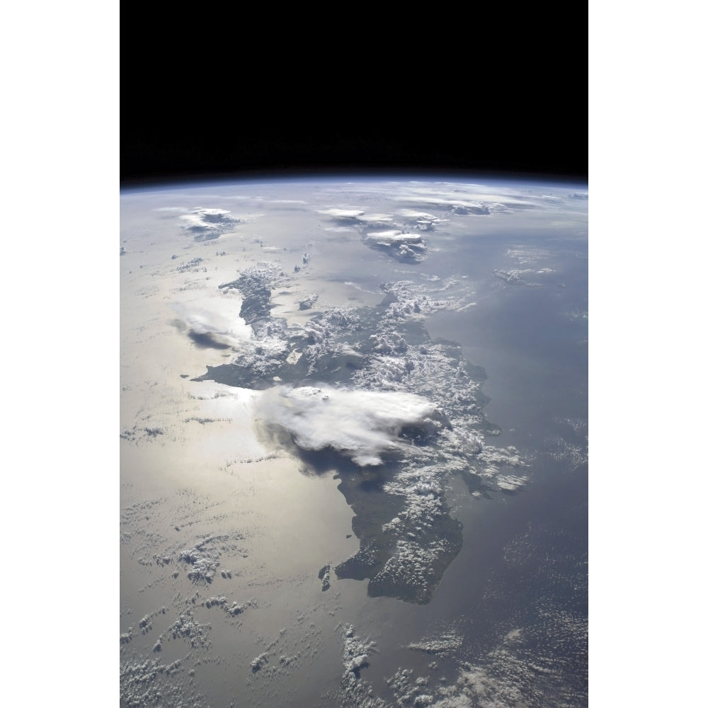 A panoramic view of the island of Hispaniola in the foreground and Cuba extending over the horizon Print Image 1