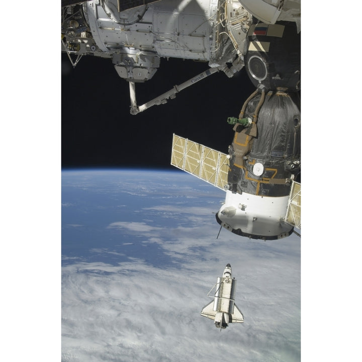 Space shuttle Endeavour a Soyuz spacecraft and the International Space Station Poster Print Image 1