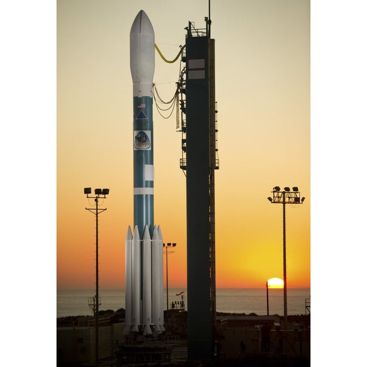 The Delta II rocket on its launch pad Poster Print Image 1