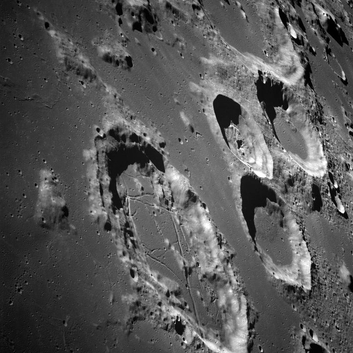 Oblique view of the lunar surface Poster Print Image 1