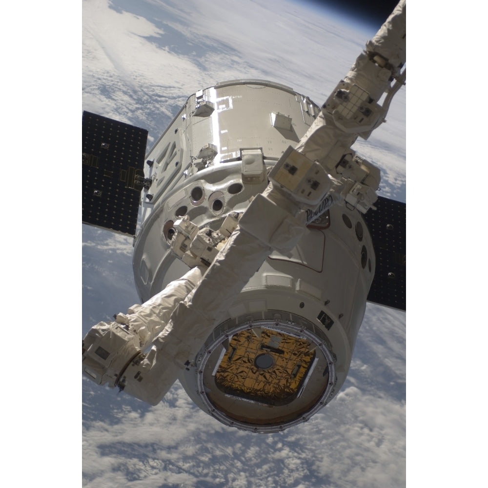 The SpaceX Dragon commercial cargo craft during grappling operations with Canadarm2 Poster Print Image 2