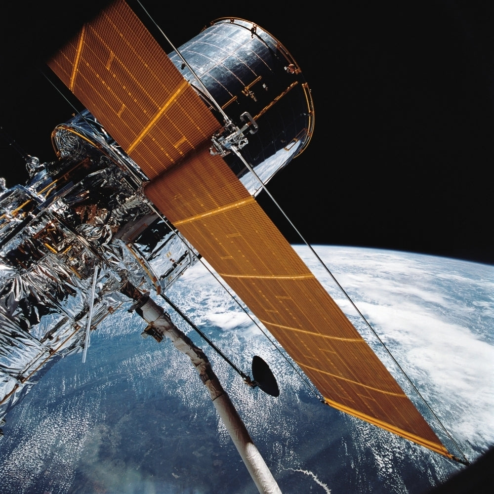 The Hubble Space Telescope backdropped by planet Earth Poster Print Image 2