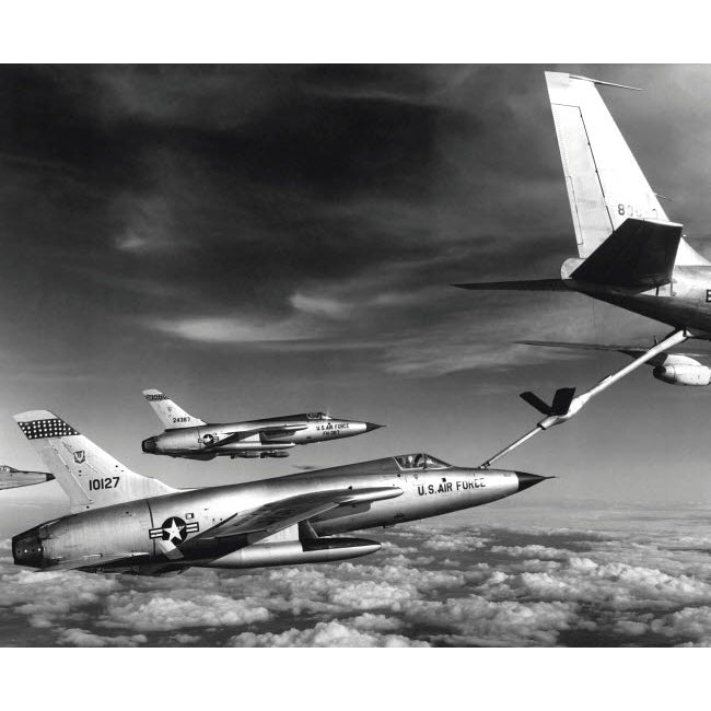 F-105 Thunderchief planes pull up to a KC-135 Stratotanker refueling aircraft 1966 Poster Print by Stocktrek Images Image 1