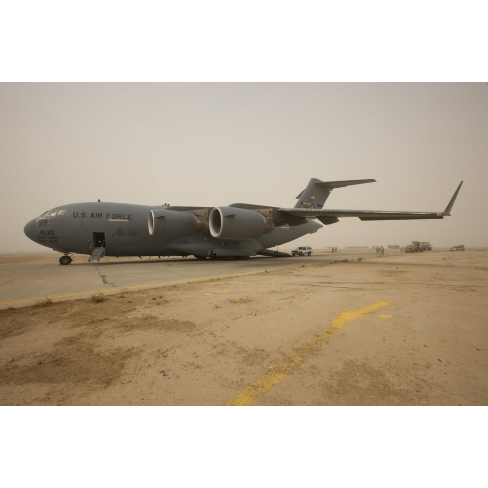 A C-17 Globemaster III sits on the runway at COB Speicher Iraq Poster Print Image 2