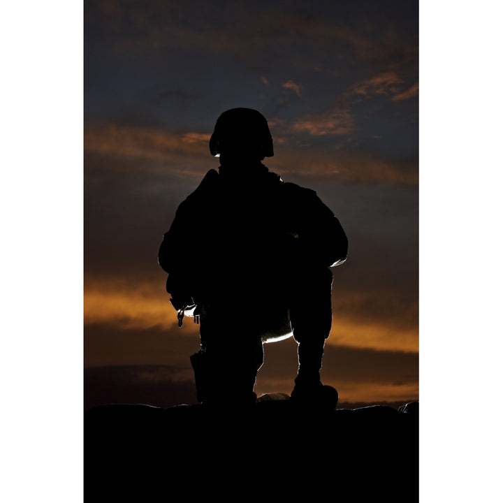 Silhouette of a U.S. Marine in uniform Poster Print Image 1