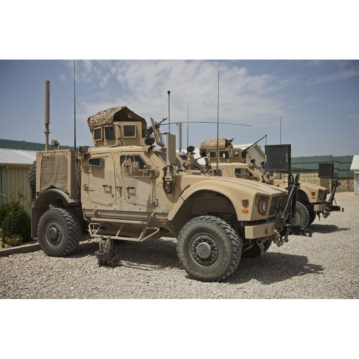 An Oshkosh M-ATV parked at a military base in Afghanistan Poster Print Image 2