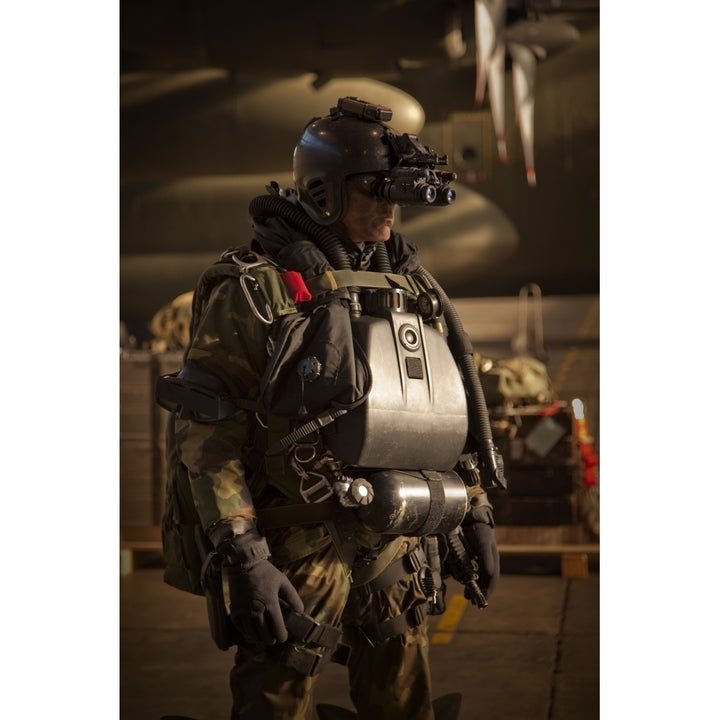 U.S. Navy Seal equipped with night vision prepares for HALO jump operations Poster Print Image 1