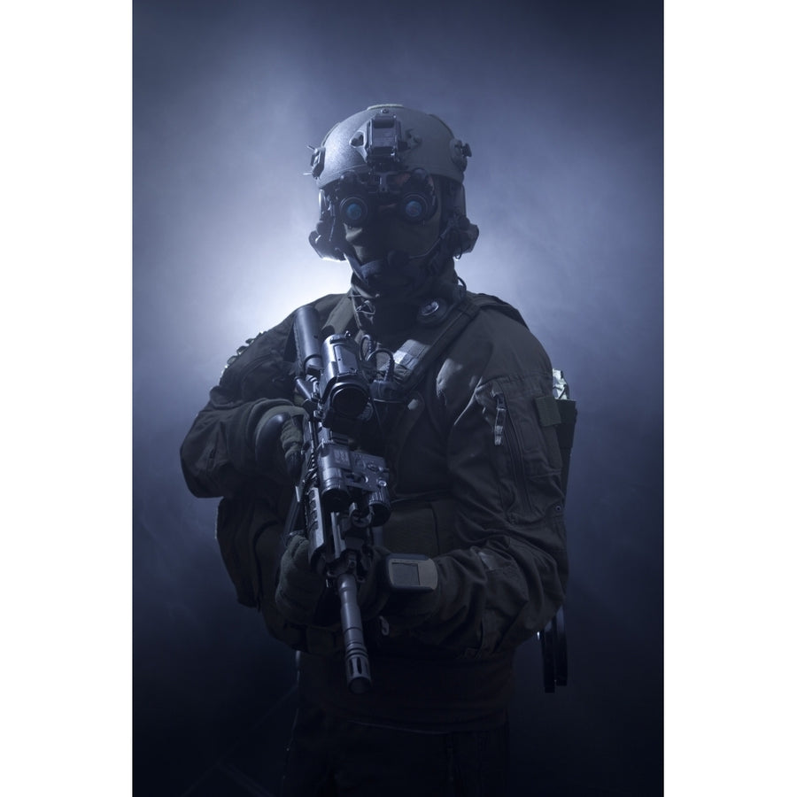 Special operations forces soldier equipped with night vision and an HK416 assault rifle Poster Print Image 1