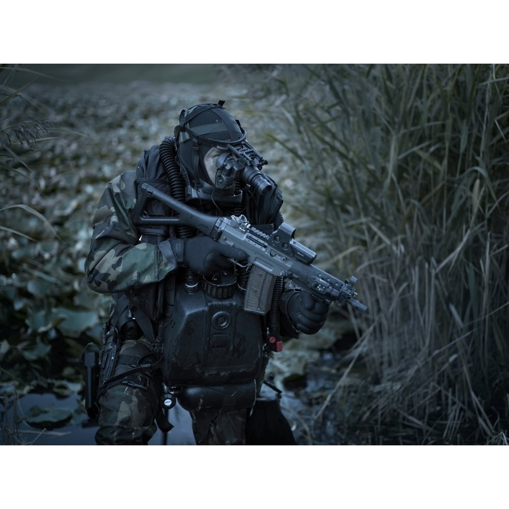 U.S. Navy SEAL equpped with night vision during a surveillance operation Poster Print Image 1