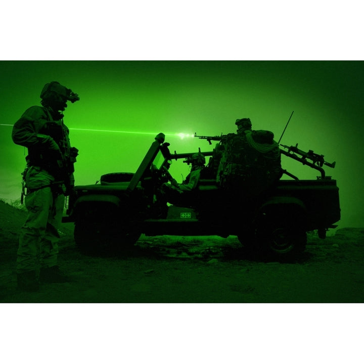 Night vision view of U.S. Special Forces on patrol Poster Print Image 1