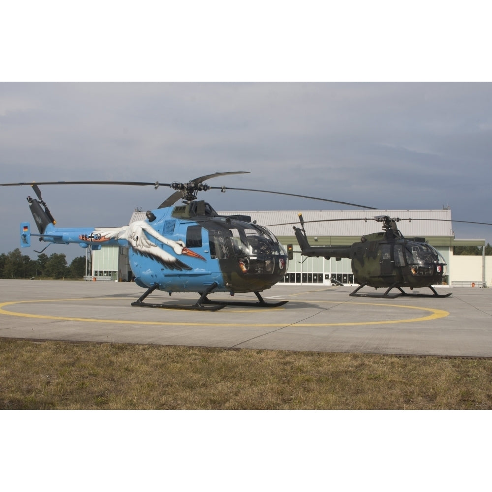 A Bo-105 liaison helicopter and a NH90 of the German Armed Forces Poster Print Image 1