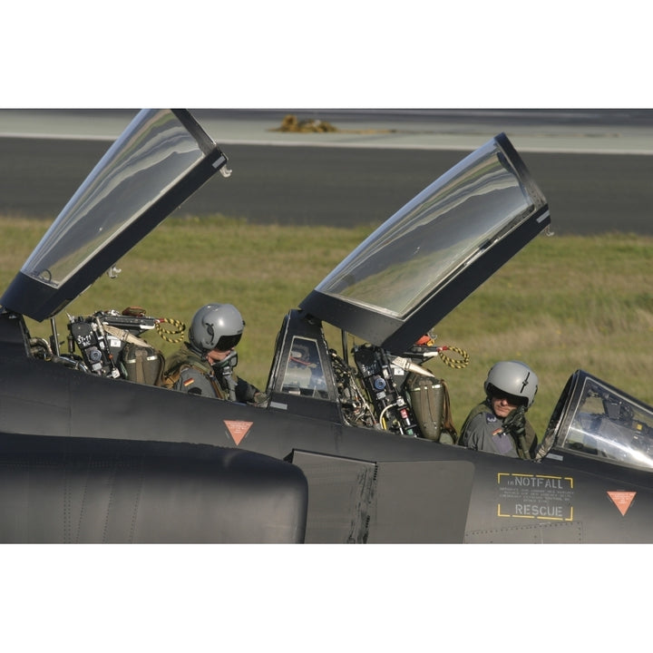 German pilots sitting in the cockpit of an F-4F Phantom Poster Print Image 1