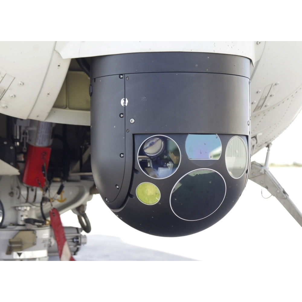 A FLIR camera mounted on an EH101 utility helicopter Poster Print Image 1